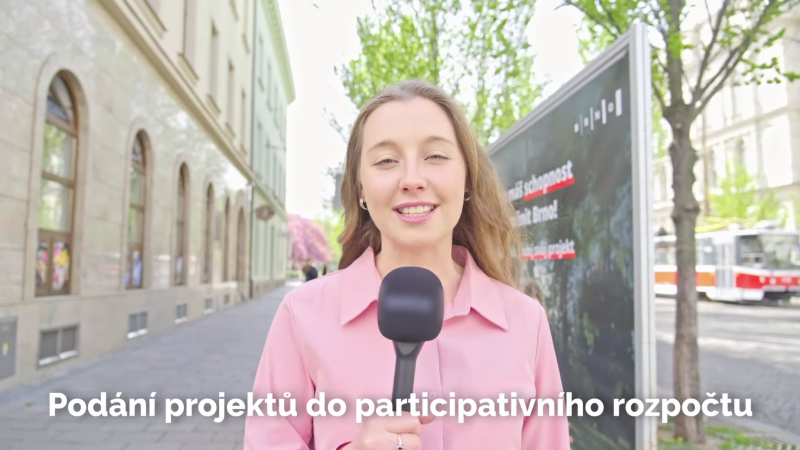 Fotograf s fotoaparátem